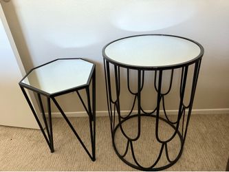 2 black metal tables with mirrored top