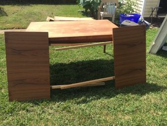 Unfinished teak dining table with leaves