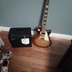 Epiphone Les Paul Guitar And Fender Amp