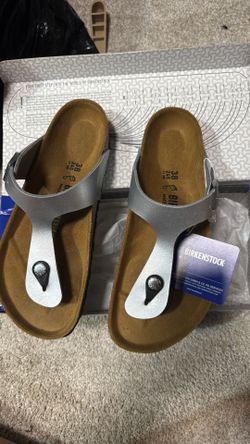 Women’s size 38 brand new authentic Birkenstocks, silver