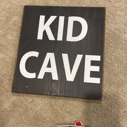 Kid Cave Sign