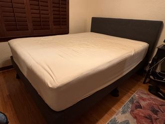 Queen bed frame/headboard (MATTRESS NOT INCLUDED)