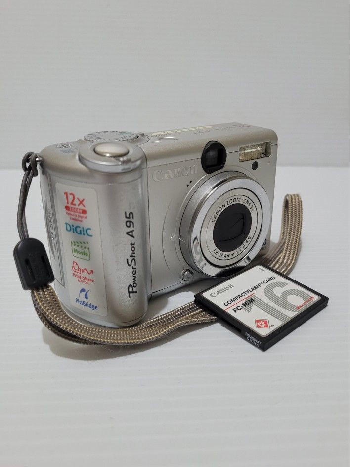 Canon PowerShot A95 Digital Camera Silver 5.0MP 12x Zoom + Compacflash Card.