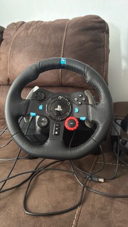 Logitech racing simulator steering wheel, pedals, and shifter