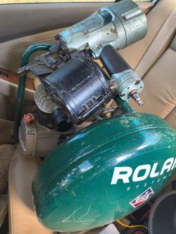 Rolair compressor and framing gun