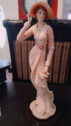 Porcelain Lady Figurine with Hat and Flowers