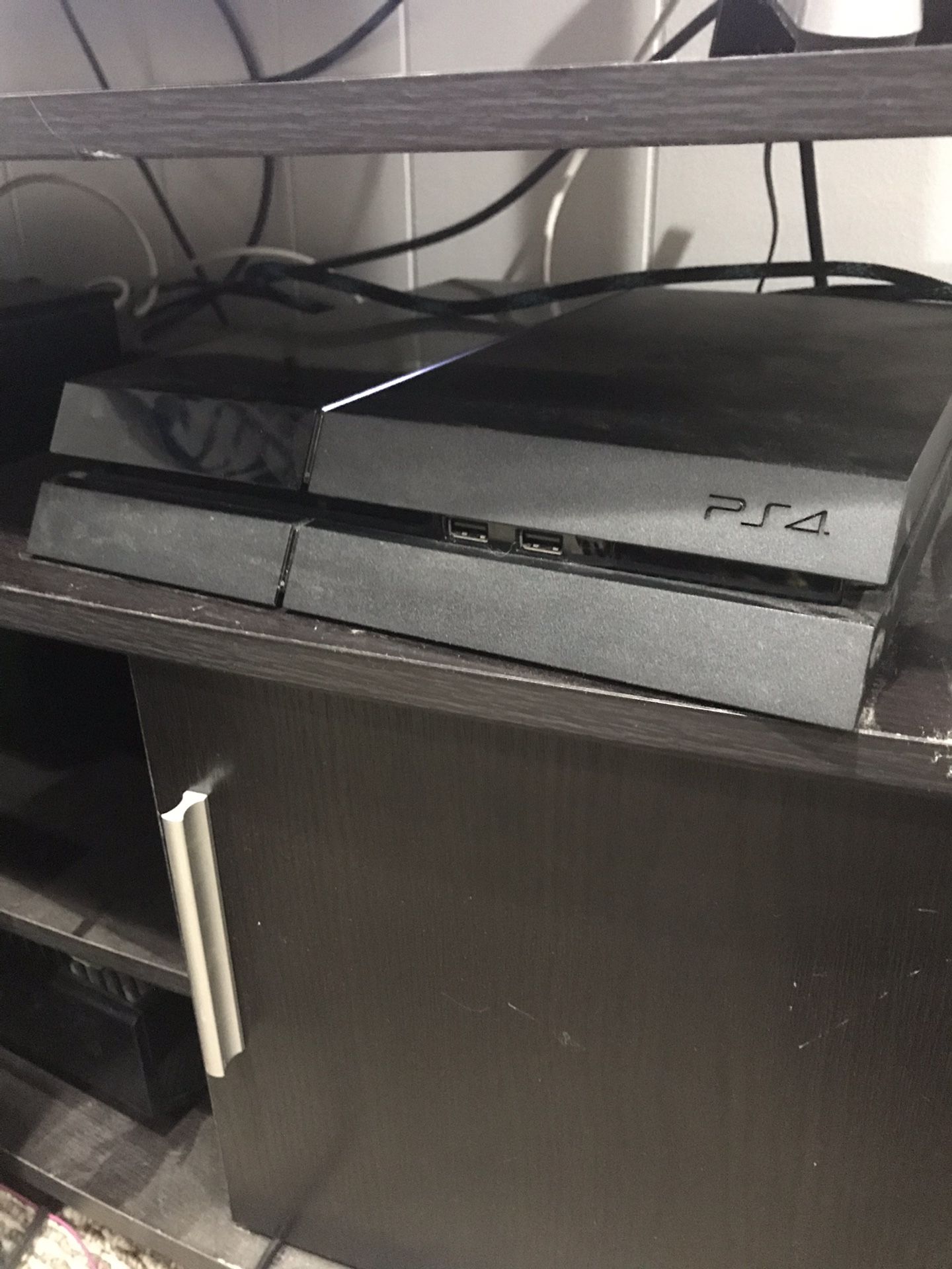 PS4 w/ controllers + games (Spider-Man)