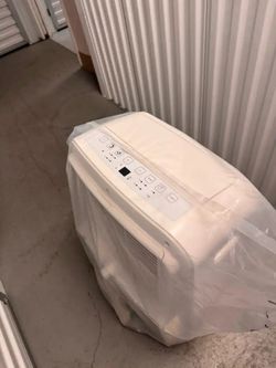 AC (barely Used) and Stainless Table (barely Used)
