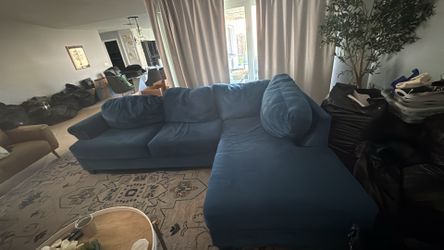 Couch with large ottoman