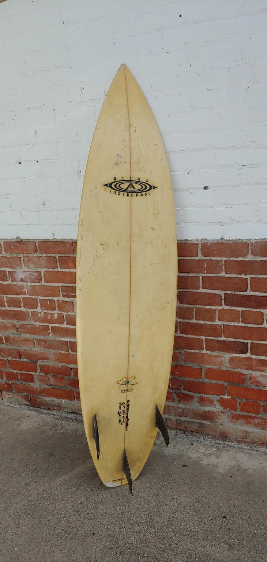 6 foot epoxy Surfboard. Needs some minor repair on tail only. Altra surfboards