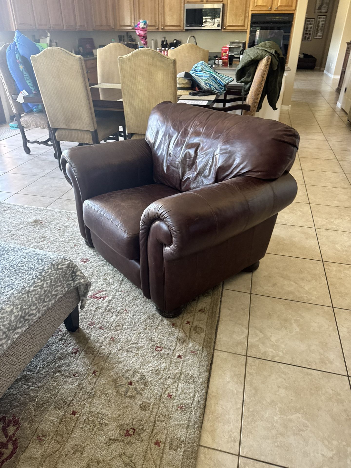 2 Couches, A Chair And An Elliptical Machine