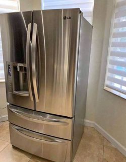LG stainless French door refrigerator with External Water & Ice Dispenser in Stainless Steel