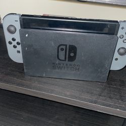 NINTENDO SWITCH STAND WORKS COMES WITH CABLES 45$