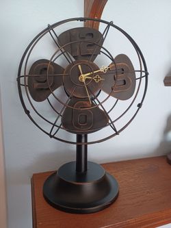 #1672, Steampunk metal fan clock.