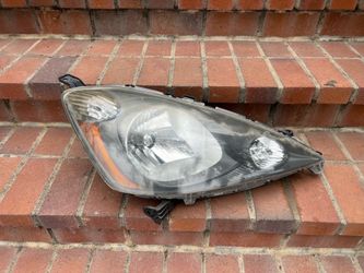 Honda fit headlight passenger side