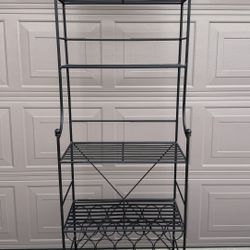 Black wrought iron wine rack / bar storage shelf