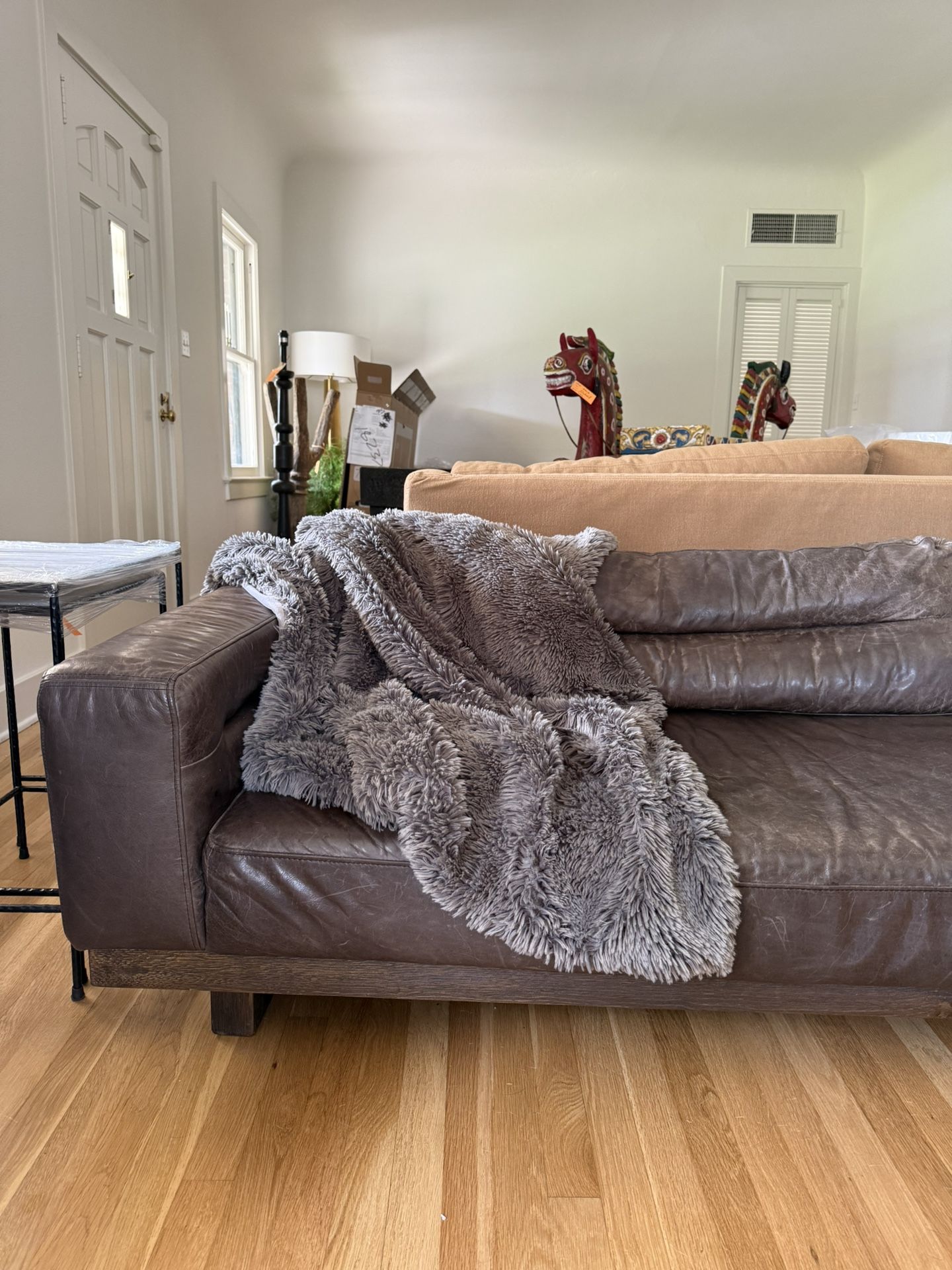 Modern Italian-Style Leather Sofa – $2,000