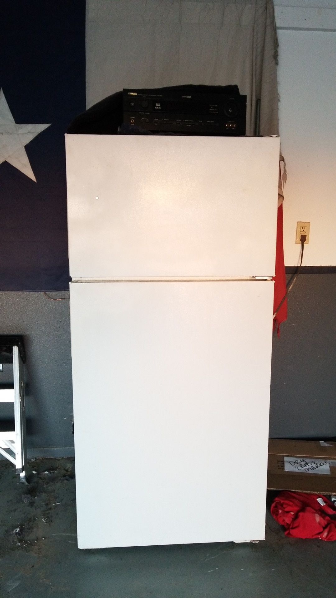 White Refrigerator great condition its in my garage to store xtra food or drinks its very cold.