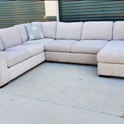 Three Piece Living Spaces Sectional Couch