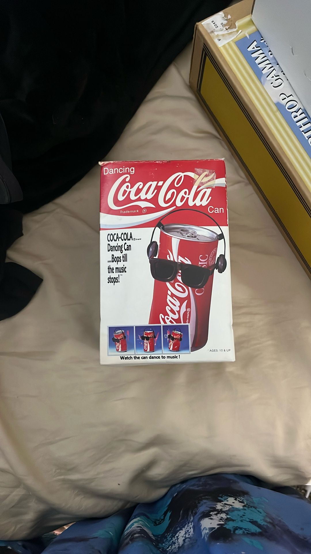 vintage coca cola dancing cola can with headphones and glasses still intact.