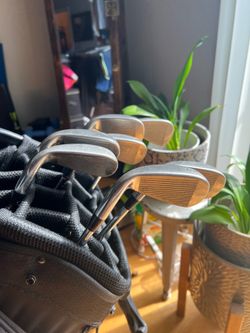 Full set of Nike V Red clubs (4-P) with Taylormade Stealth Rescue Hybrid and Bag