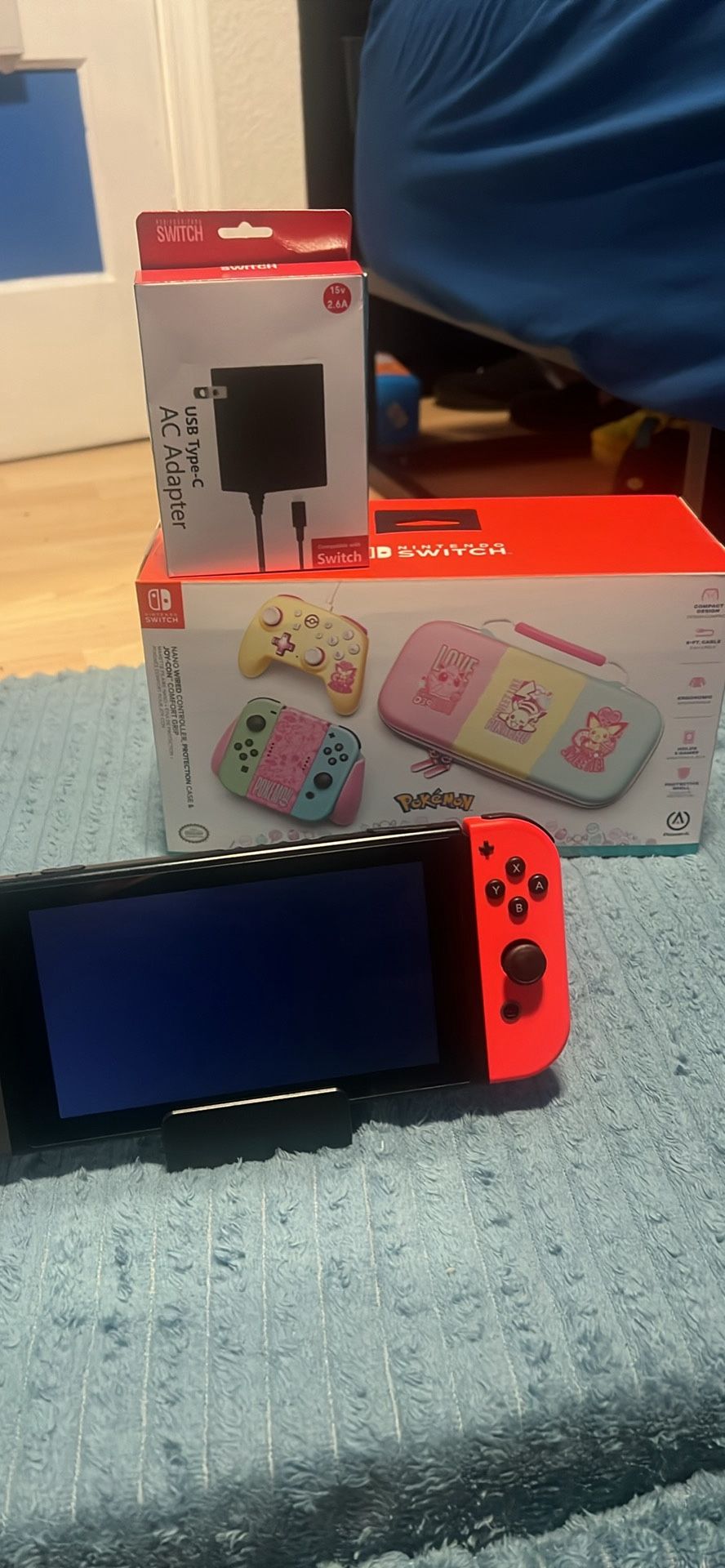 Nintendo switch with brand new Pokémon accessories , docking station, and Pokémon shield game