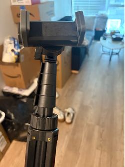 Tripod-selfie stick combo with a phone mount