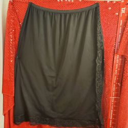 Black Half Slip. Ladies M-L. New, Never Used.