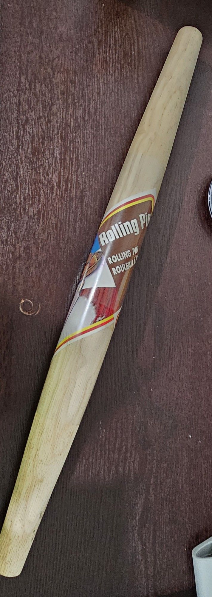 New never used tapered rolling pin with easy handle. 
