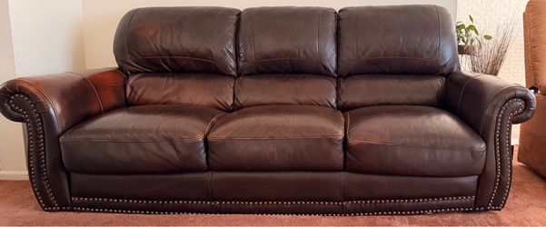 Brown Leather Sofa and Loveseat.
