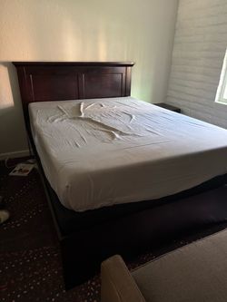 Dark Wood Queen Sized Bed
