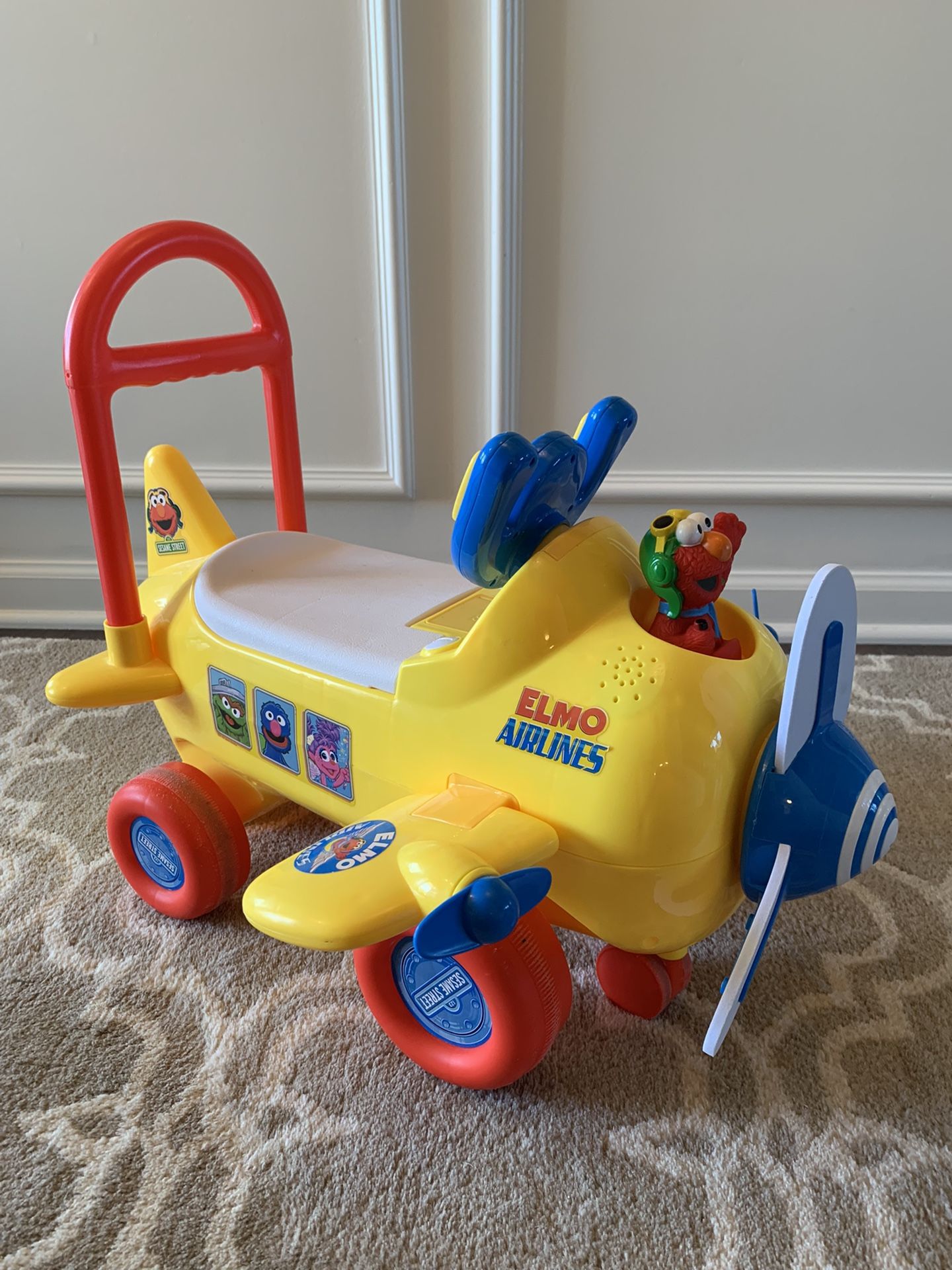 Sesame Street Elmo Airlines Ride-on Airplane