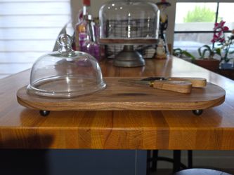 Oval acacia wood and cheese charcuterie board.