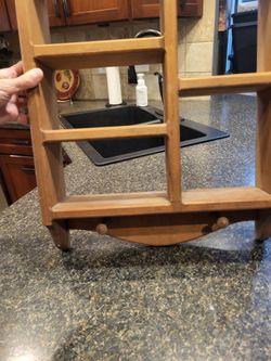 Country style vintage wooden shadow box shelf with a heart cutout design and small hanging pegs at the bottom 15x22 x3.5"