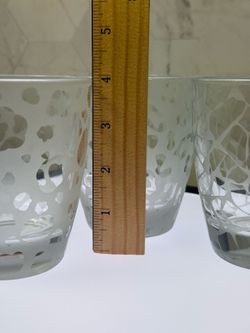 Set of (4) Rare tumblers featuring distinctive frosted patterns likely with leopard, giraffe, zebra mosaic designs.