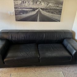 Black leather sofa/couch