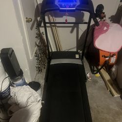 A cheer Treadmill/ Weider Work Out Bench