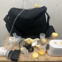 Medela Pump In Style MaxFlow Breast Pump with Power Supply and Bag