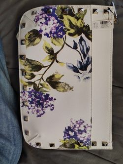 Brand new with tags White House Black Market White Floral Faux Leather Clutch/Wristlet