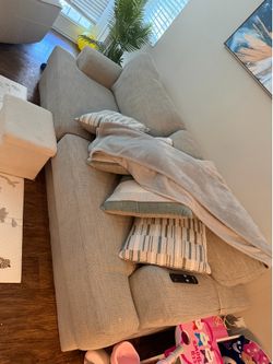 Modern couch for living room in Perfect Condition. Barely used.