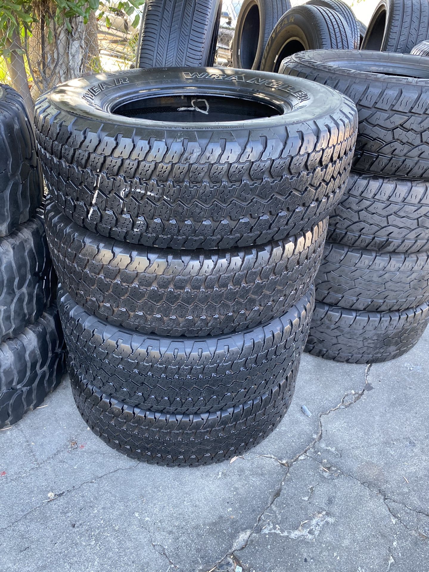 SET GOODYEAR WRANGLER ATS 265/70/17 $200 INCLUDE PROFESSIONAL INSTALLATION AND TAX