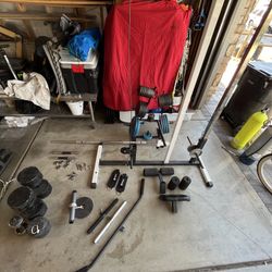 weightlifting setup with cable machine and plates 