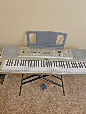 Photo **NEW** YAMAHA PORTABLE GRAND KEYBOARD - YPG-235