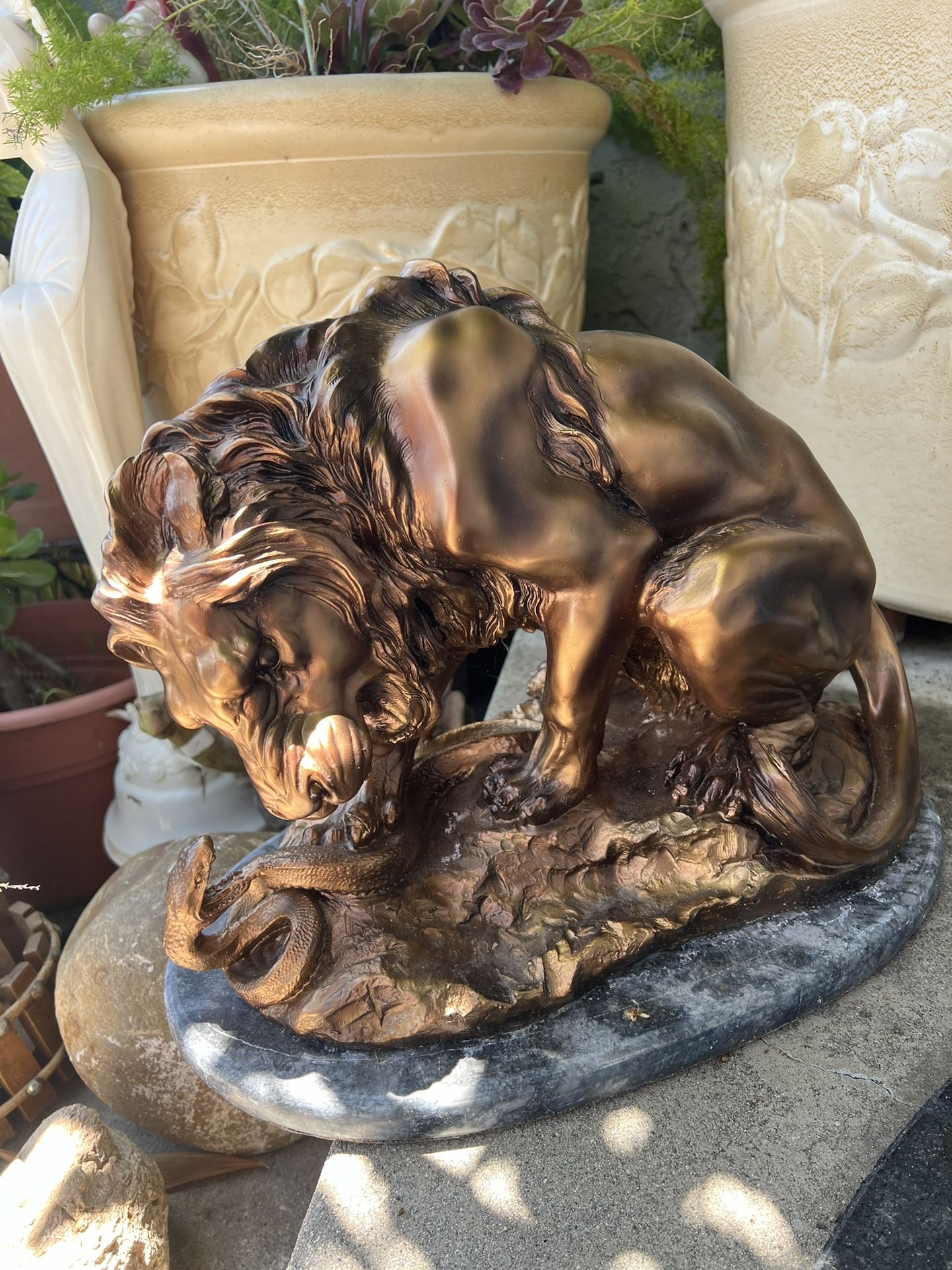 Lion And Serpent Sculpture