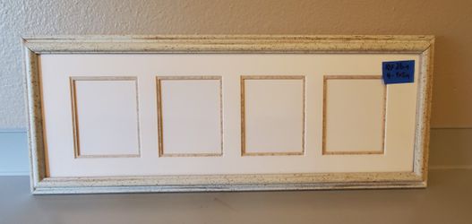 White frame with matting 4- 4x5 openings