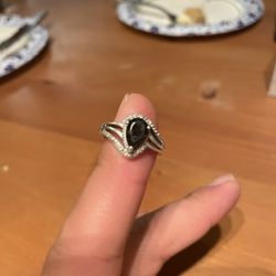 Silver ring with purple and clear stones 