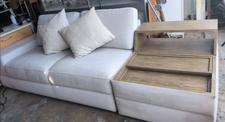 Gaming couch with plugs
