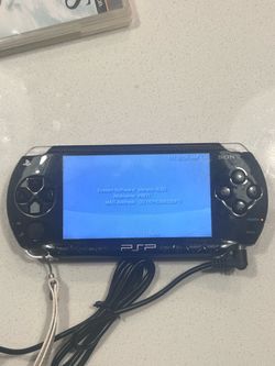 PSP- 1000 w/ Charger
