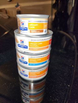 3 large, 1 small cans of Hill's Prescription Diet c/d Multicare Urinary Care with 3 different flavors Canned Cat Food