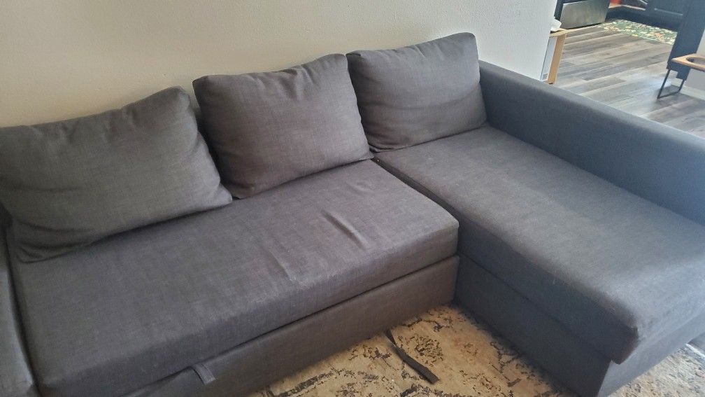 7 1/2 Ft GREY PULLOUT COUCH PICK UP ONLY